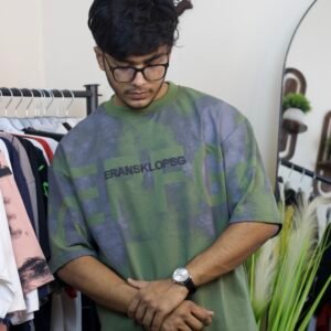 Oversized drop shoulder t-shirt in a green and blue tie-dye style
