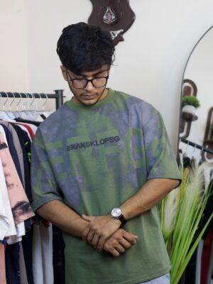 Oversized drop shoulder t-shirt in a green and blue tie-dye style